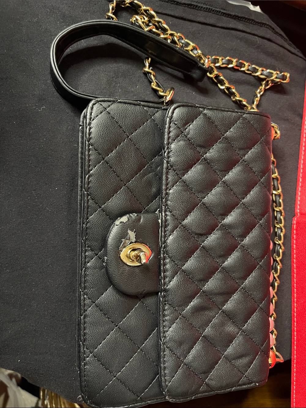 Quilted Black Chain-Handle Shoulder Bag.